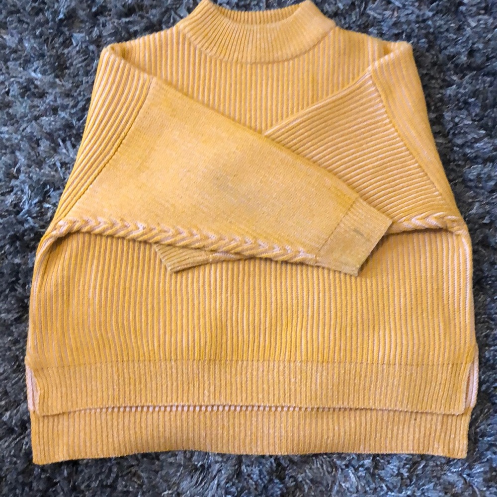 Yellow vertically striped knitted sweater